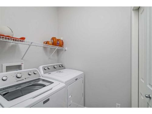 103 Bridle Estates Mews Sw, Calgary, AB - Indoor Photo Showing Laundry Room