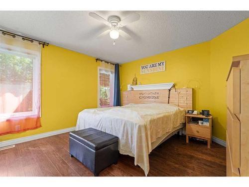 115 Dunham Lane, Diamond Valley, AB - Indoor Photo Showing Bedroom