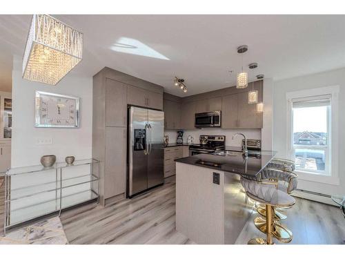 1307-240 Skyview Ranch Road Ne, Calgary, AB - Indoor Photo Showing Kitchen With Stainless Steel Kitchen