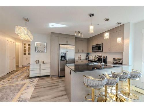 1307-240 Skyview Ranch Road Ne, Calgary, AB - Indoor Photo Showing Kitchen With Double Sink