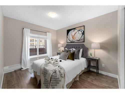 203-30 Discovery Ridge Close Sw, Calgary, AB - Indoor Photo Showing Bedroom