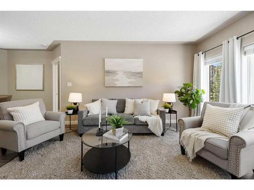 203-30 Discovery Ridge Close Sw, Calgary, AB - Indoor Photo Showing Living Room