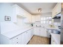 5-115 Bergen Road Nw, Calgary, AB  - Indoor Photo Showing Kitchen With Double Sink 