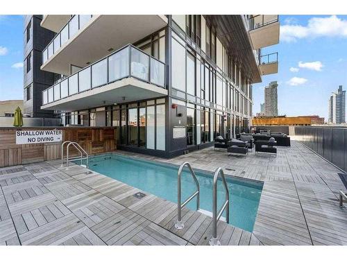 1106-1010 6 Street Sw, Calgary, AB - Outdoor With In Ground Pool With Exterior