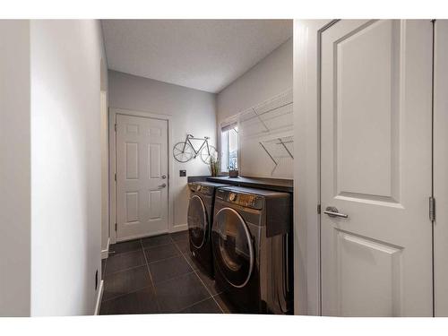 100 Cranridge Crescent Se, Calgary, AB - Indoor Photo Showing Laundry Room