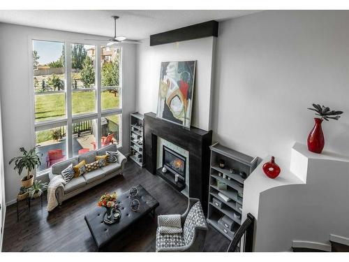 100 Cranridge Crescent Se, Calgary, AB - Indoor With Fireplace