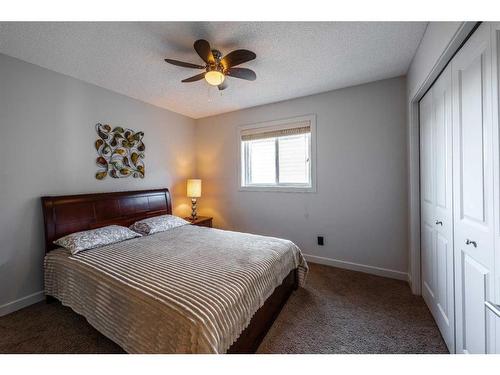 100 Cranridge Crescent Se, Calgary, AB - Indoor Photo Showing Bedroom