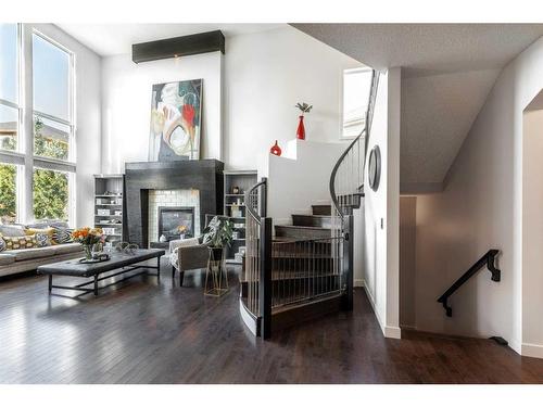 100 Cranridge Crescent Se, Calgary, AB - Indoor Photo Showing Living Room With Fireplace