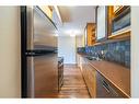 403-123 24 Avenue Sw, Calgary, AB  - Indoor Photo Showing Kitchen With Double Sink 