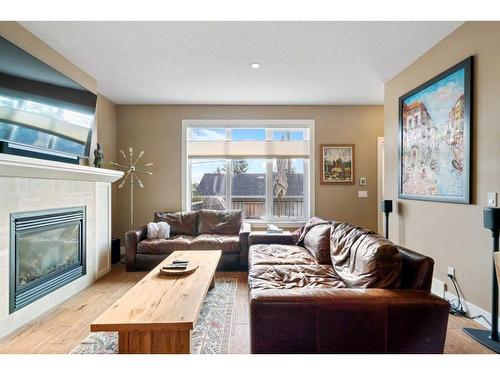 1626A 41 Street Sw, Calgary, AB - Indoor Photo Showing Living Room With Fireplace