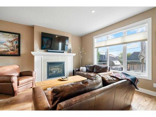 1626A 41 Street Sw, Calgary, AB - Indoor Photo Showing Living Room With Fireplace