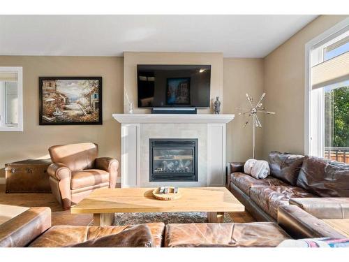 1626A 41 Street Sw, Calgary, AB - Indoor Photo Showing Living Room With Fireplace