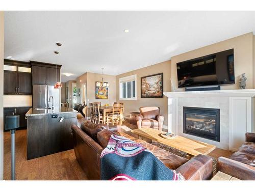 1626A 41 Street Sw, Calgary, AB - Indoor Photo Showing Living Room With Fireplace