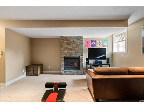 1626A 41 Street Sw, Calgary, AB - Indoor Photo Showing Living Room With Fireplace