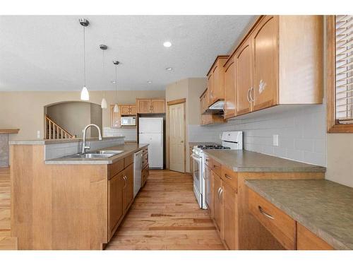 9 Panamount Row Nw, Calgary, AB - Indoor Photo Showing Kitchen With Double Sink