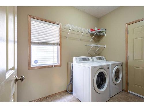 9 Panamount Row Nw, Calgary, AB - Indoor Photo Showing Laundry Room