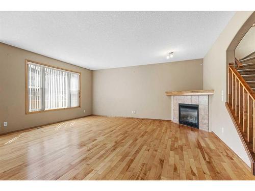 9 Panamount Row Nw, Calgary, AB - Indoor With Fireplace