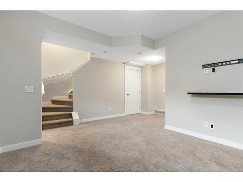 182 Willow Green, Cochrane, AB - Indoor Photo Showing Other Room