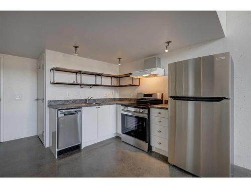 413-535 8 Avenue Se, Calgary, AB - Indoor Photo Showing Kitchen With Stainless Steel Kitchen