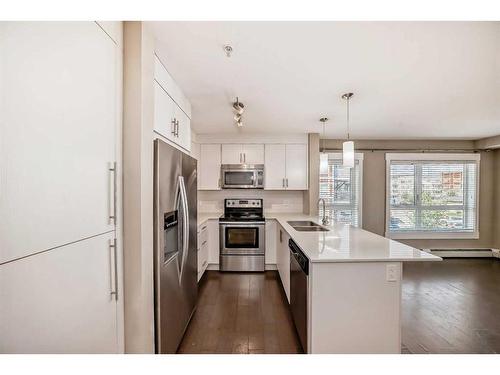 1301-302 Skyview Ranch Drive Ne, Calgary, AB - Indoor Photo Showing Kitchen With Double Sink With Upgraded Kitchen