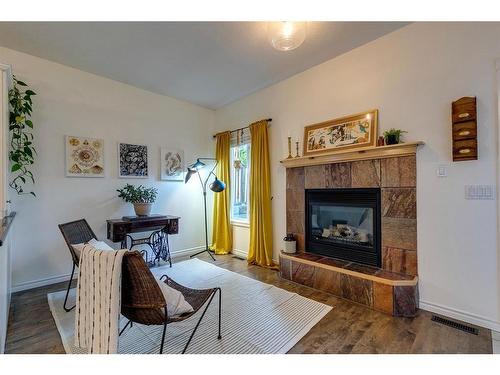 1633 18 Avenue Nw, Calgary, AB - Indoor Photo Showing Living Room With Fireplace