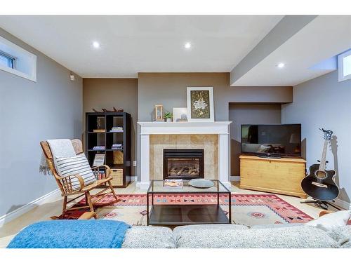 1633 18 Avenue Nw, Calgary, AB - Indoor Photo Showing Basement With Fireplace