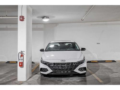 410-8445 Broadcast Avenue Sw, Calgary, AB - Indoor Photo Showing Garage