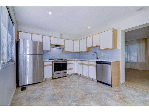 142-999 Canyon Meadows Drive Sw, Calgary, AB - Indoor Photo Showing Kitchen With Stainless Steel Kitchen