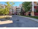 2226-10 Prestwick Bay Se, Calgary, AB  - Outdoor With Balcony With Facade 