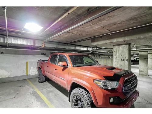 2226-10 Prestwick Bay Se, Calgary, AB - Indoor Photo Showing Garage