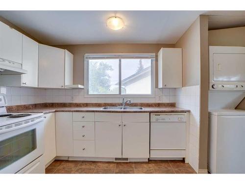 12A Beaver Dam Place Ne, Calgary, AB - Indoor Photo Showing Kitchen With Double Sink