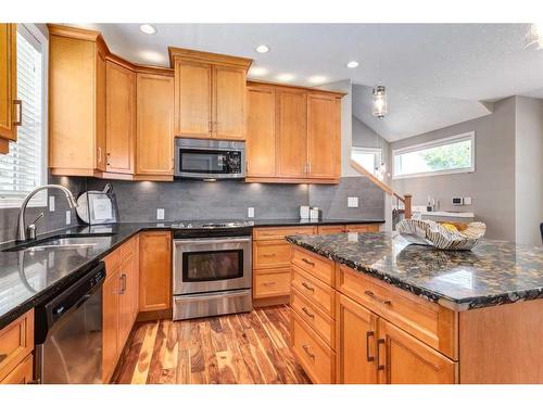 41 New Brighton Heights Se, Calgary, AB - Indoor Photo Showing Kitchen With Double Sink With Upgraded Kitchen