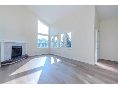 301 Fonda Way Se, Calgary, AB - Indoor With Fireplace