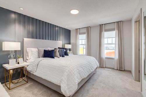 83 Heirloom Boulevard Se, Calgary, AB - Indoor Photo Showing Bedroom