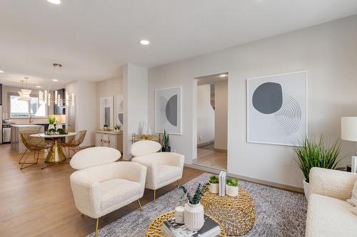 83 Heirloom Boulevard Se, Calgary, AB - Indoor Photo Showing Living Room