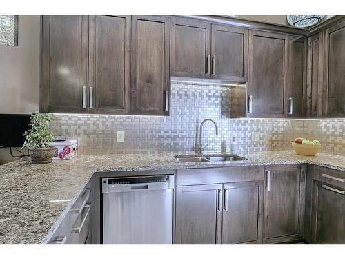 328 Brae Glen Road Sw, Calgary, AB - Indoor Photo Showing Kitchen With Double Sink With Upgraded Kitchen