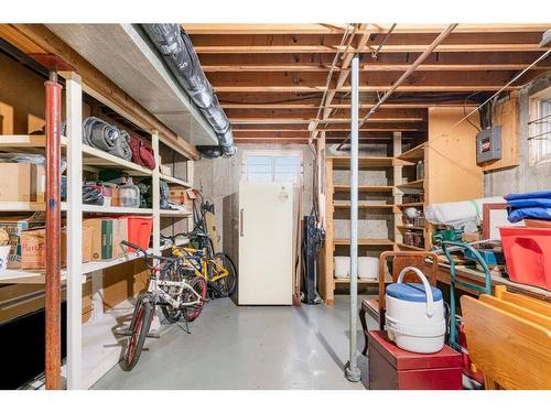 42 Malibou Road Sw, Calgary, AB - Indoor Photo Showing Basement