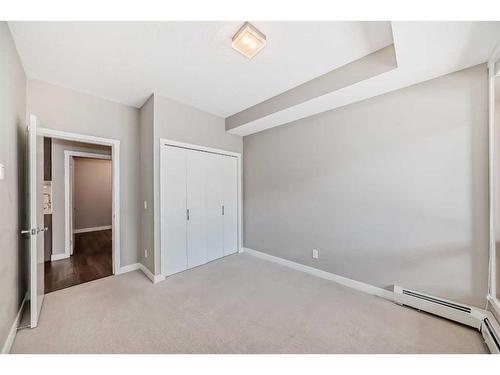 109-823 5 Avenue Nw, Calgary, AB - Indoor Photo Showing Other Room