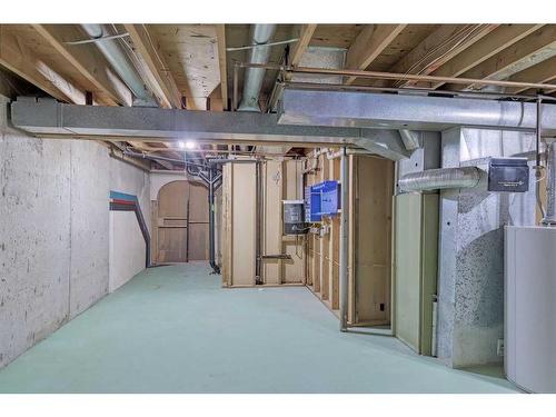 115 Queen Charlotte Place Se, Calgary, AB - Indoor Photo Showing Basement