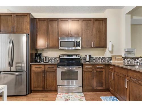 125 Chapalina Square Se, Calgary, AB - Indoor Photo Showing Kitchen