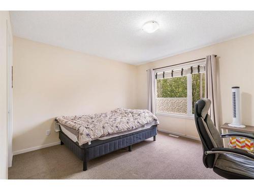 125 Chapalina Square Se, Calgary, AB - Indoor Photo Showing Bedroom