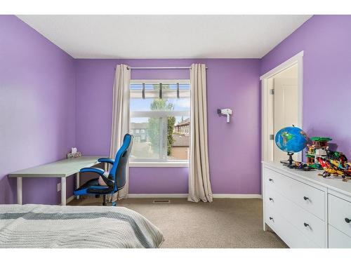 125 Chapalina Square Se, Calgary, AB - Indoor Photo Showing Bedroom