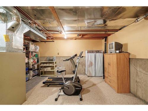 4-10457 19 Street Sw, Calgary, AB - Indoor Photo Showing Basement