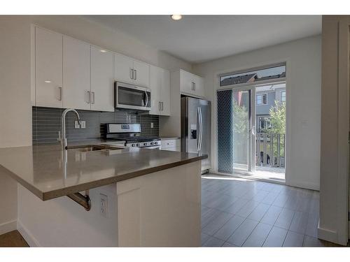 128 Walden Path Se, Calgary, AB - Indoor Photo Showing Kitchen