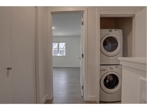 128 Walden Path Se, Calgary, AB - Indoor Photo Showing Laundry Room