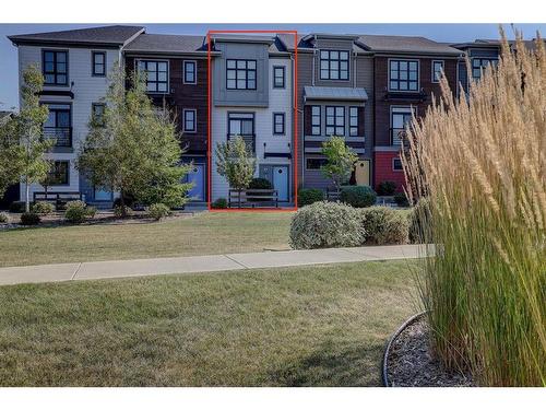 128 Walden Path Se, Calgary, AB - Outdoor With Balcony With Facade