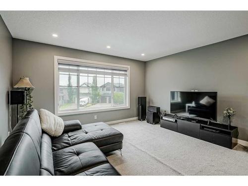 32 Legacy Cove Se, Calgary, AB - Indoor Photo Showing Living Room