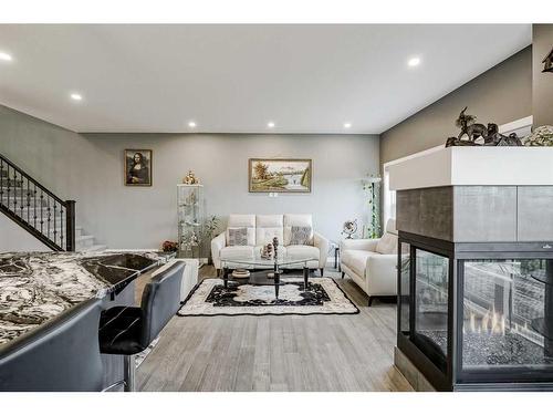 32 Legacy Cove Se, Calgary, AB - Indoor With Fireplace