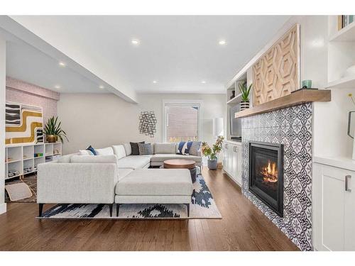 432 Strathcona Mews Sw, Calgary, AB - Indoor Photo Showing Living Room With Fireplace