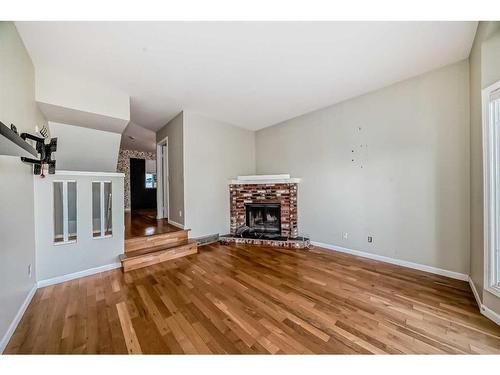 1928 29 Avenue Sw, Calgary, AB - Indoor Photo Showing Living Room With Fireplace